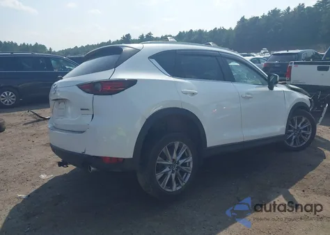 2021 Mazda Cx-5 Grand Touring z USA, uszkodzony, nr VIN JM3KFBDM5M0317866